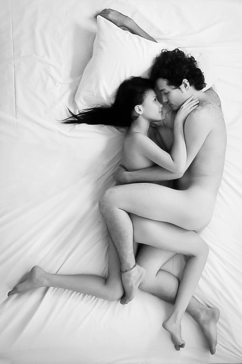 Erotic couples in bed