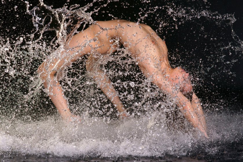 Girl in splashes of water