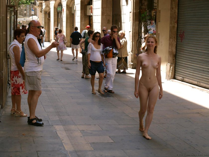 Walks naked along the street