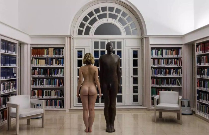 Naked women in the library
