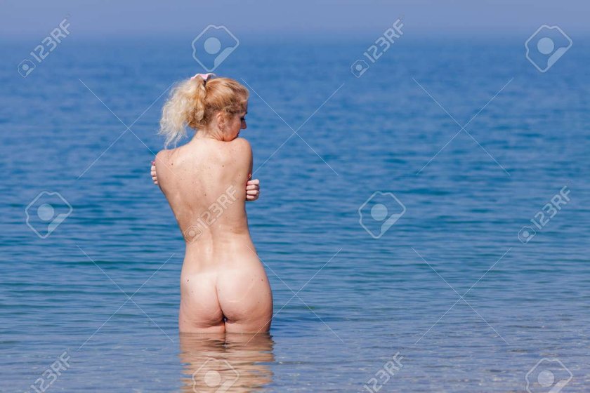 Girl Topless on the beach