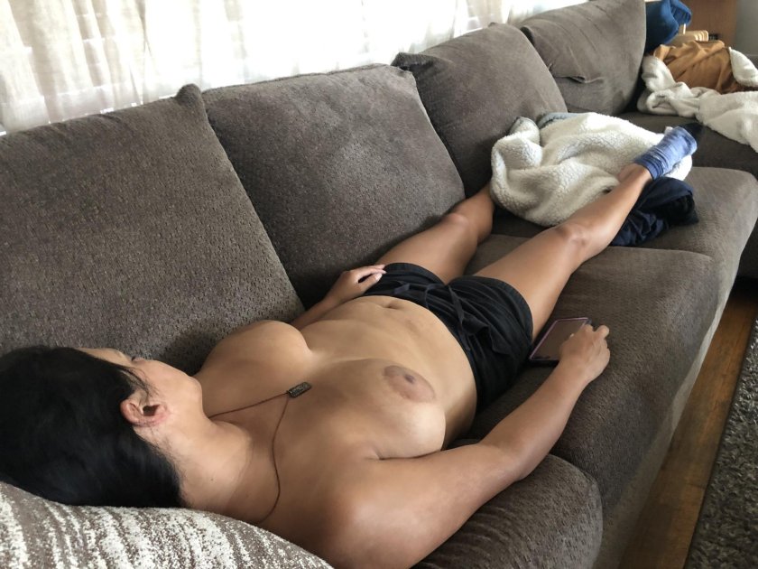 The girl sleeps on couch