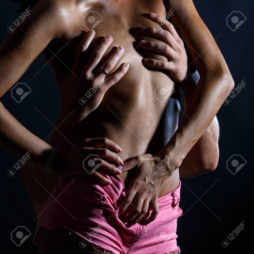The guy passionately undresses girl