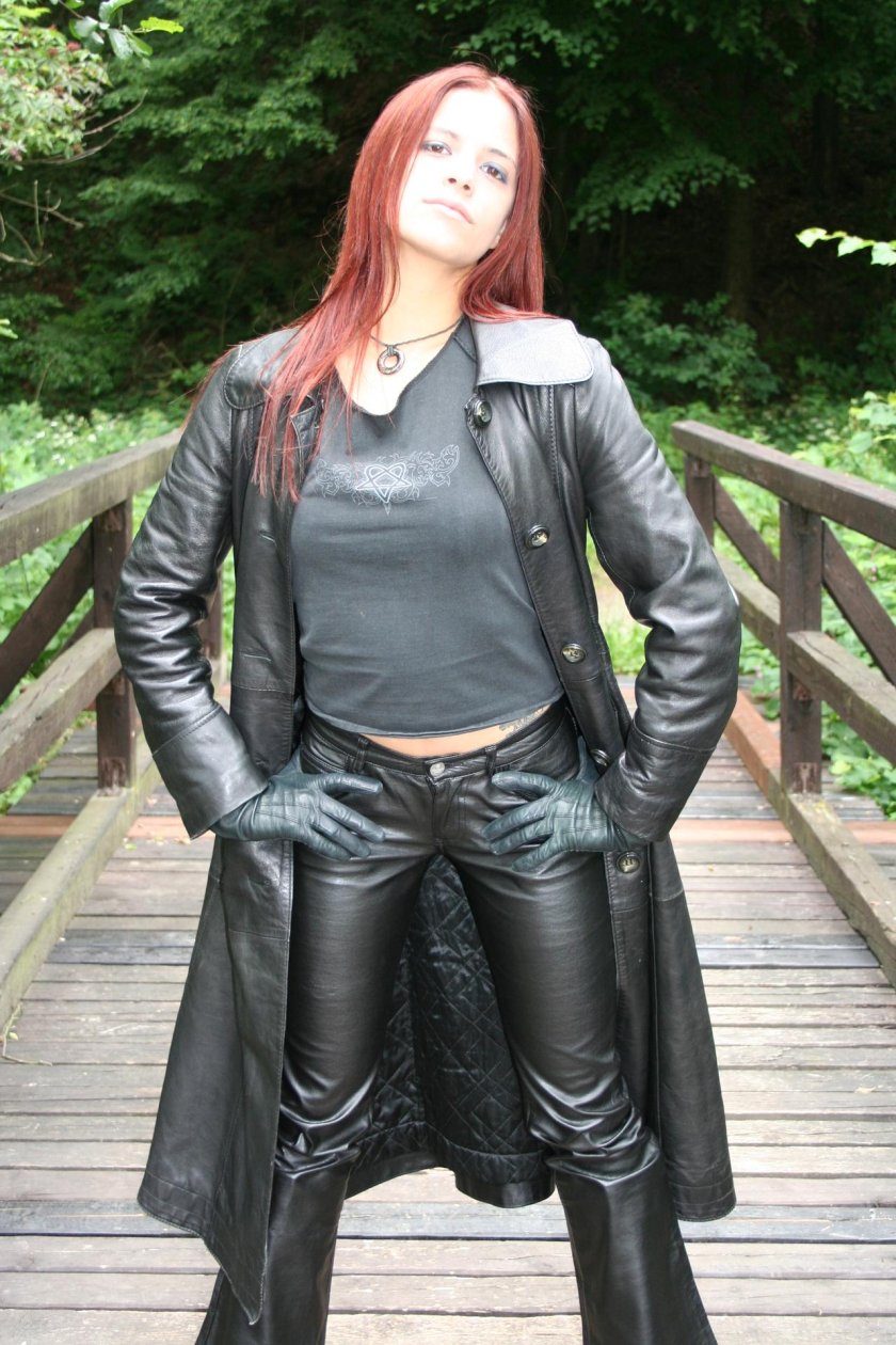 Girl in leather cloak