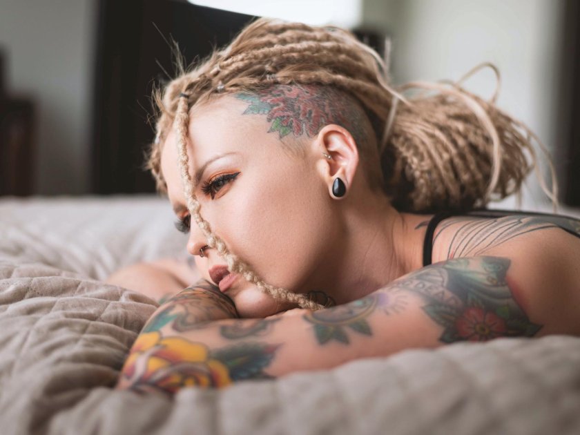 Girl with dreadlocks and piercing