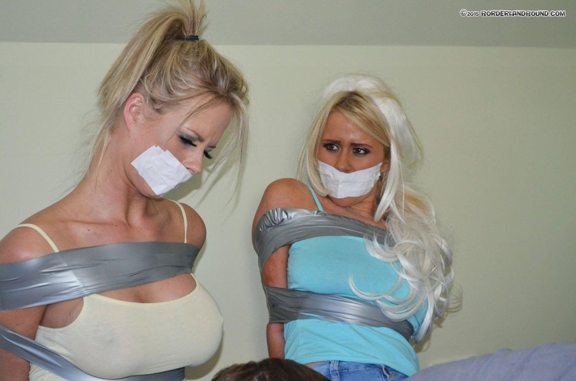 Girls connected by tape