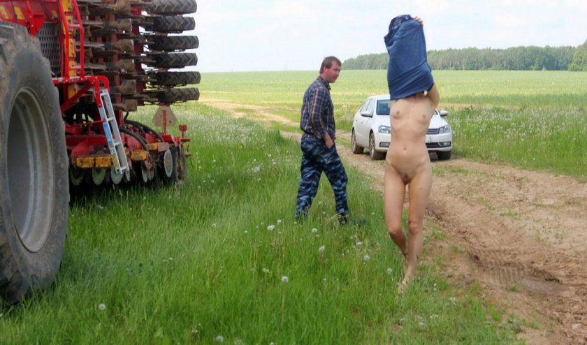 Naked collective farmers in the field