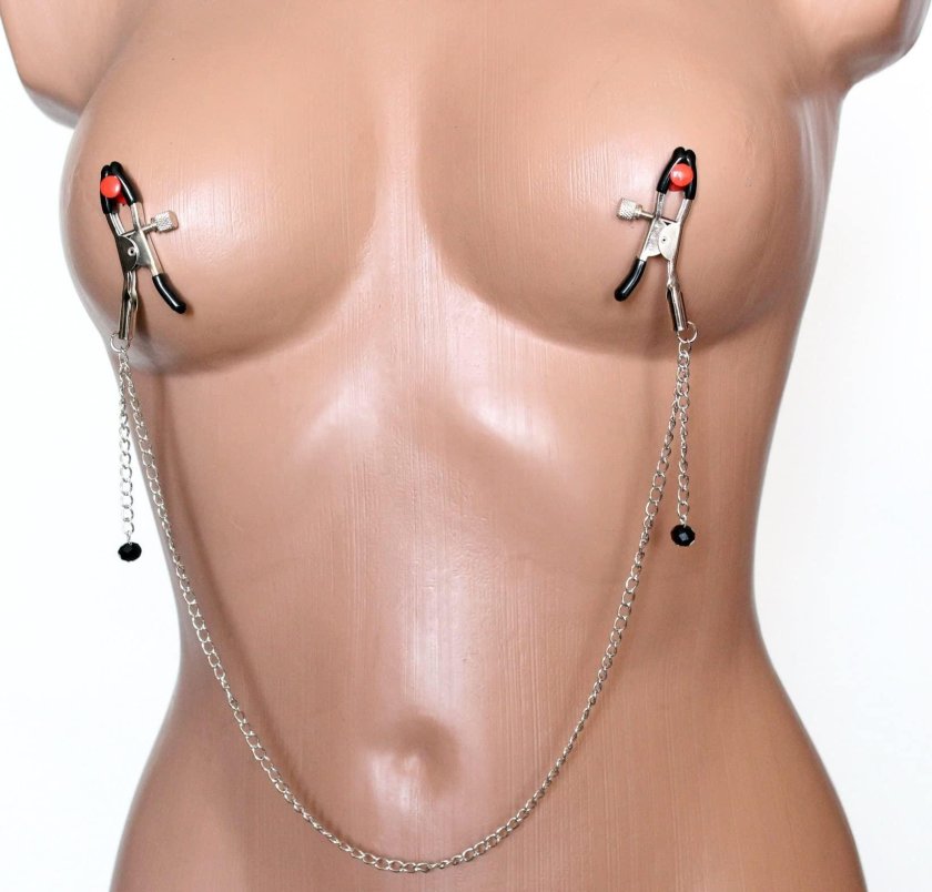 Clamps for nipples with a chain