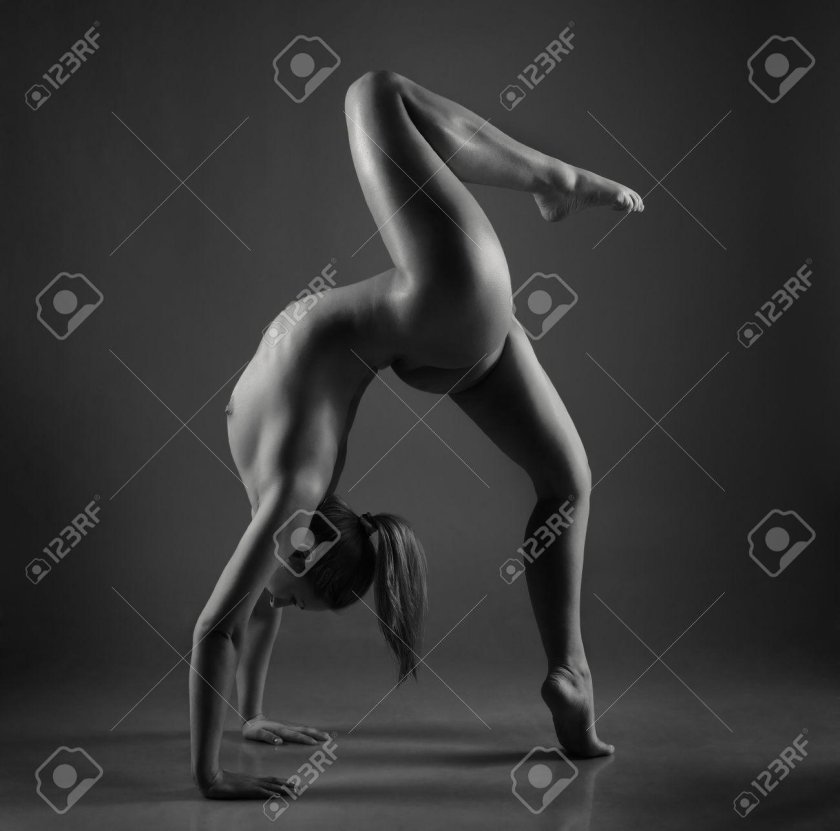 Naked woman in the lotus pose
