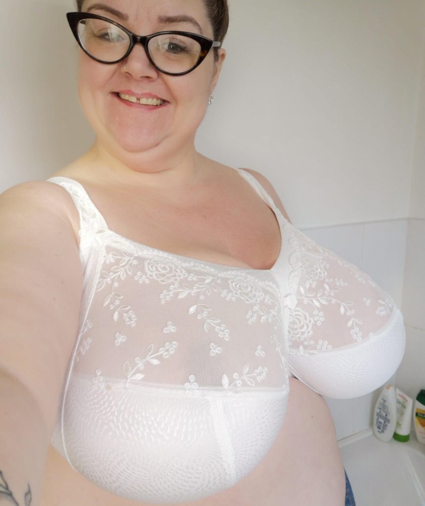 Big breasts of mother -in -law in a bra