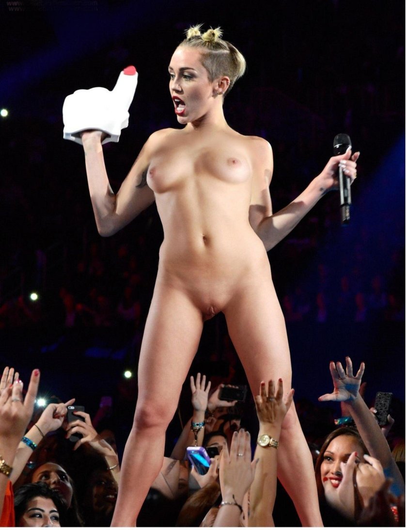 Miley Cyrus naked at a concert