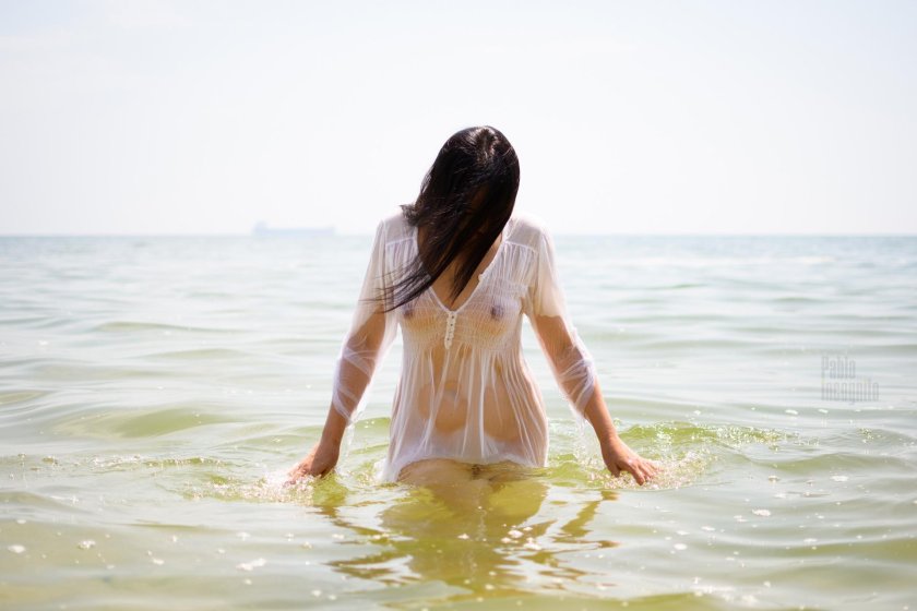 Beautiful girls in wet clothes