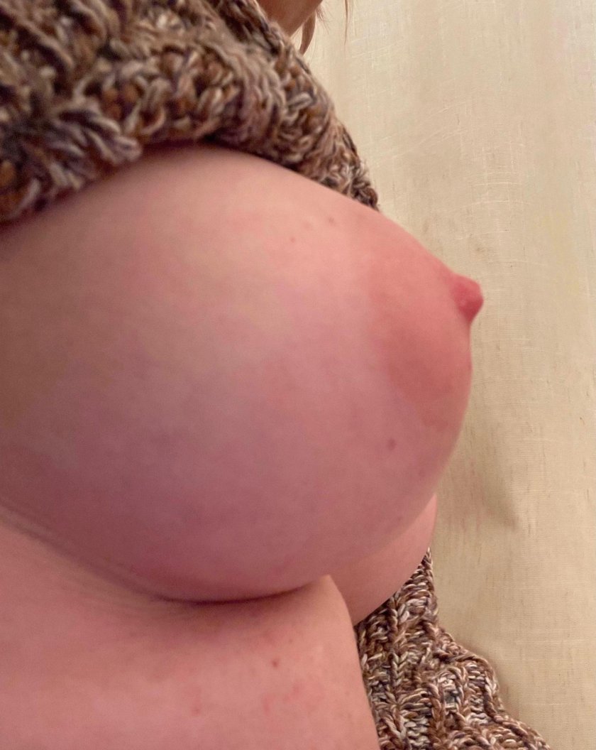 Big boobs through a sweater