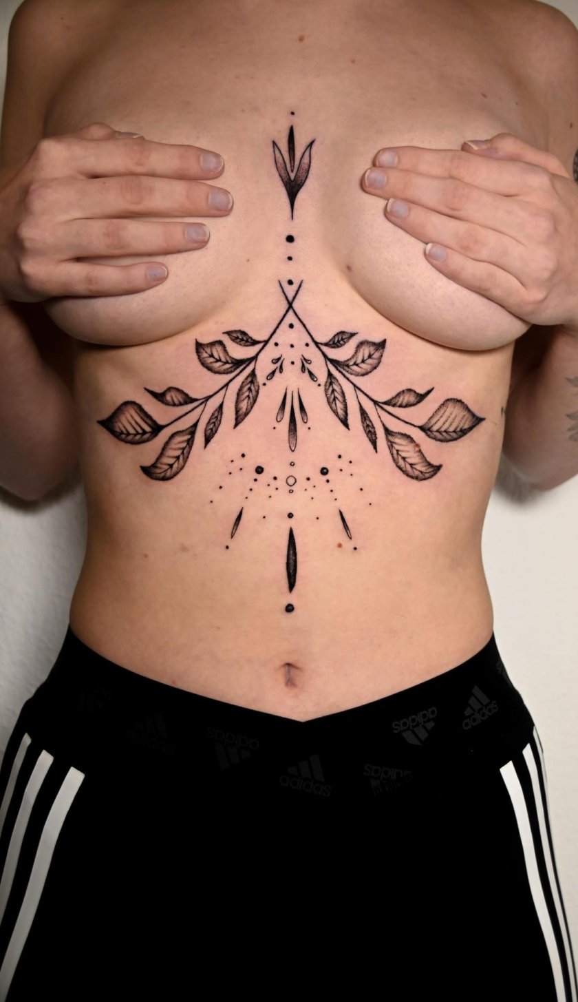 Breast tattoo for girls