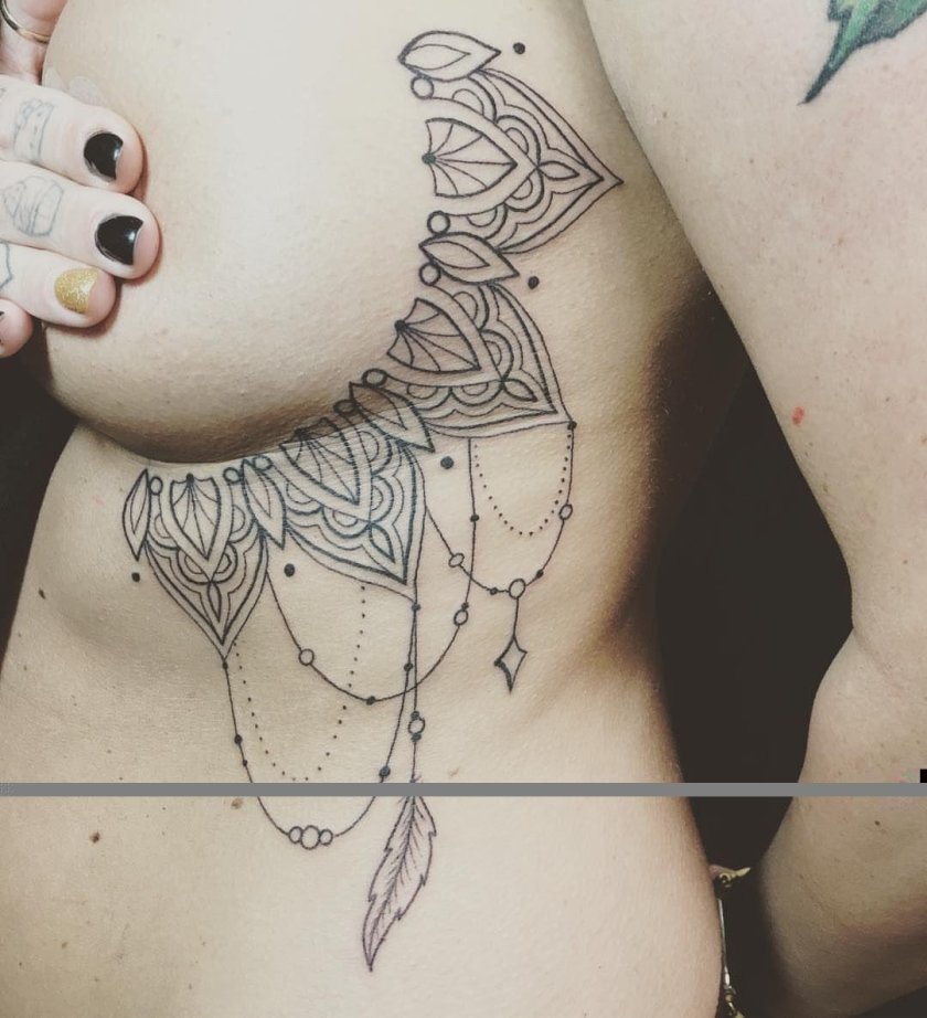 Tattoo for girls under the chest