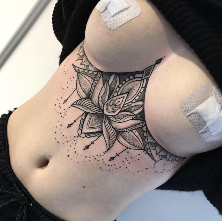 Tattoo under female breast