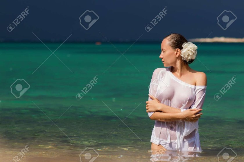 Girl in a wet white shirt