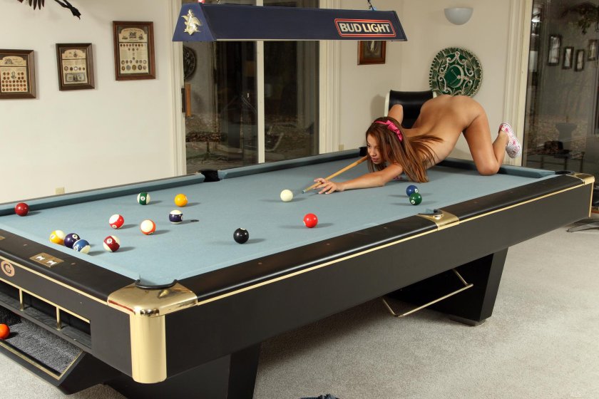 Naked on a billiard table